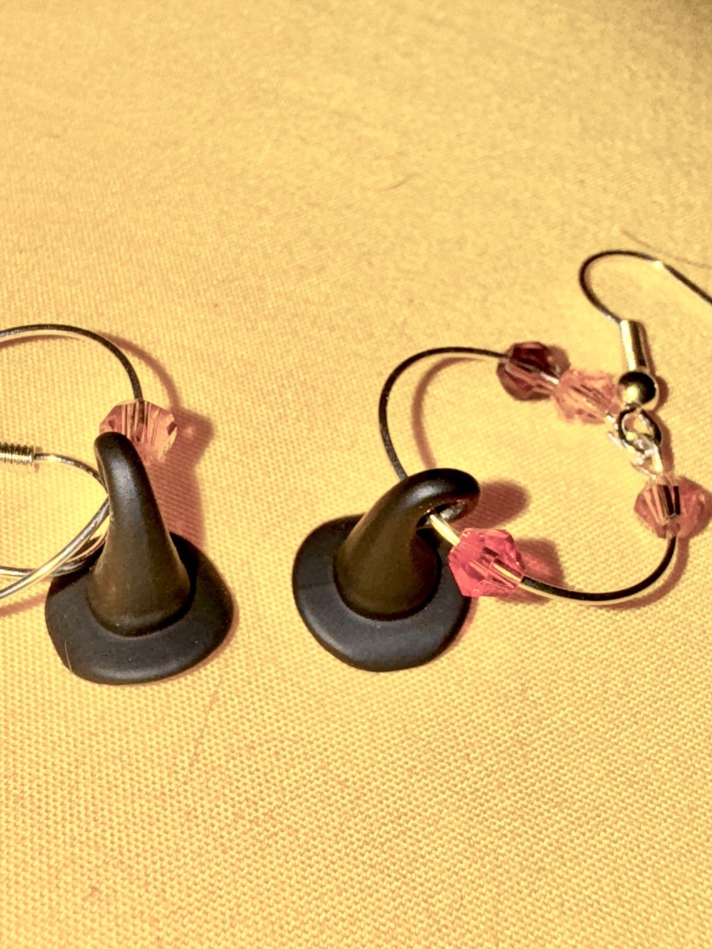 Delicate hoops with witches hats and silver chain with dangling withes hats